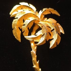 Vintage gold tone palm tree brooch